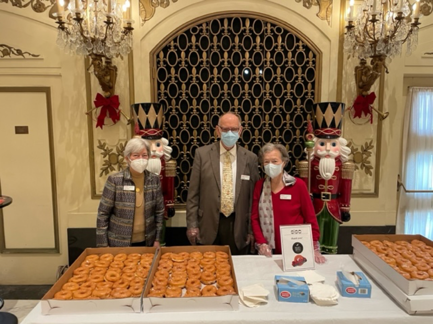SVA behind table of donuts