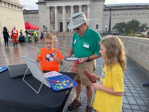 SVA member with kids on Art Hill